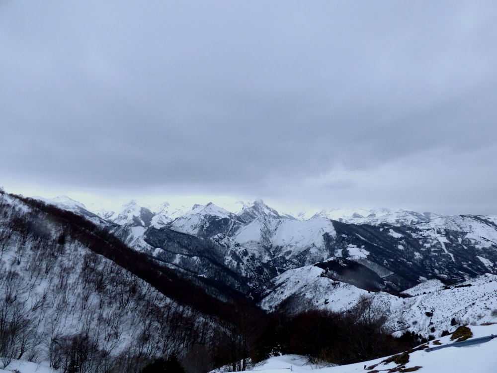 snow-covered mountains during daytime