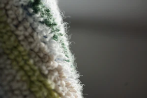 Close-up of soft, breathable fabric of kids' gym wear in vibrant colors