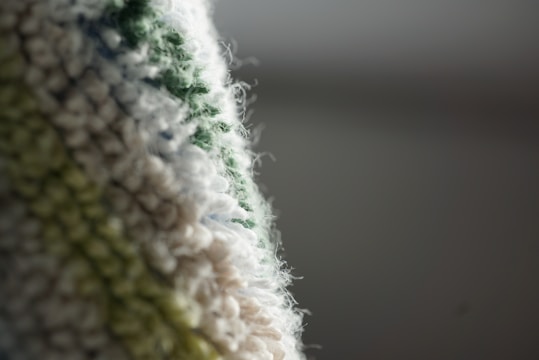 A close-up of eco-friendly fabric swatches featuring various textures and colors.