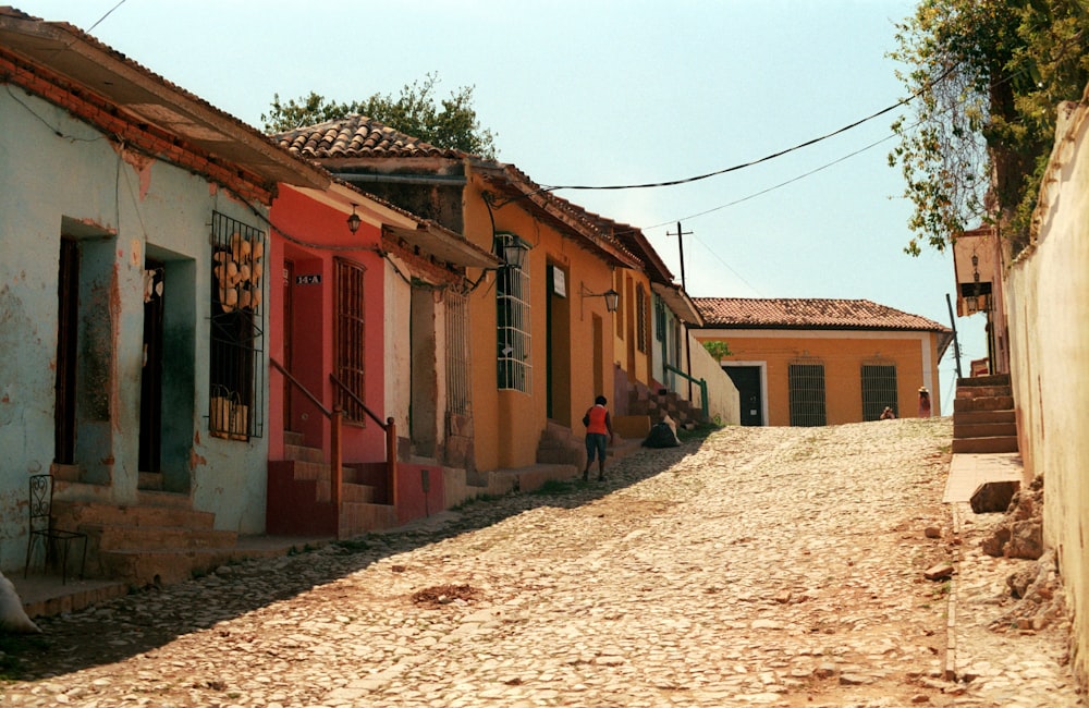 brown and red concrete house during daytime