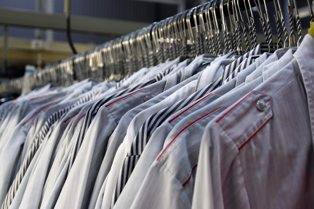 assorted clothes hanging