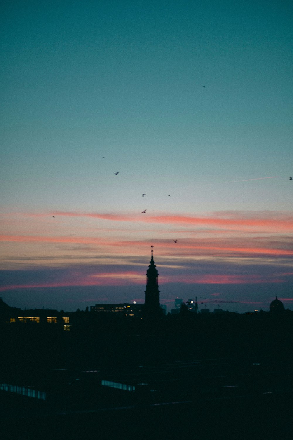 tower under orange and blue sky