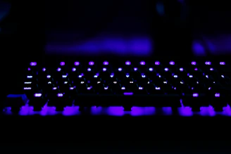 A futuristic neon-lit keyboard with vibrant colors.