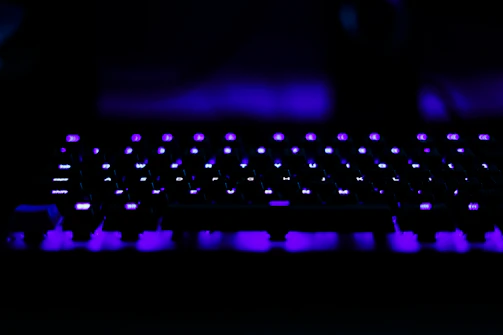 A futuristic neon-lit keyboard with vibrant colors.