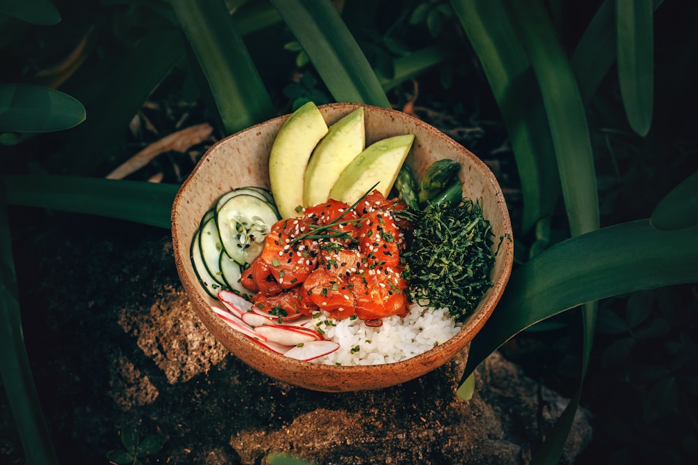 sliced vegetables on brown bowl