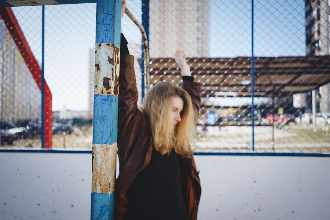 woman near fence