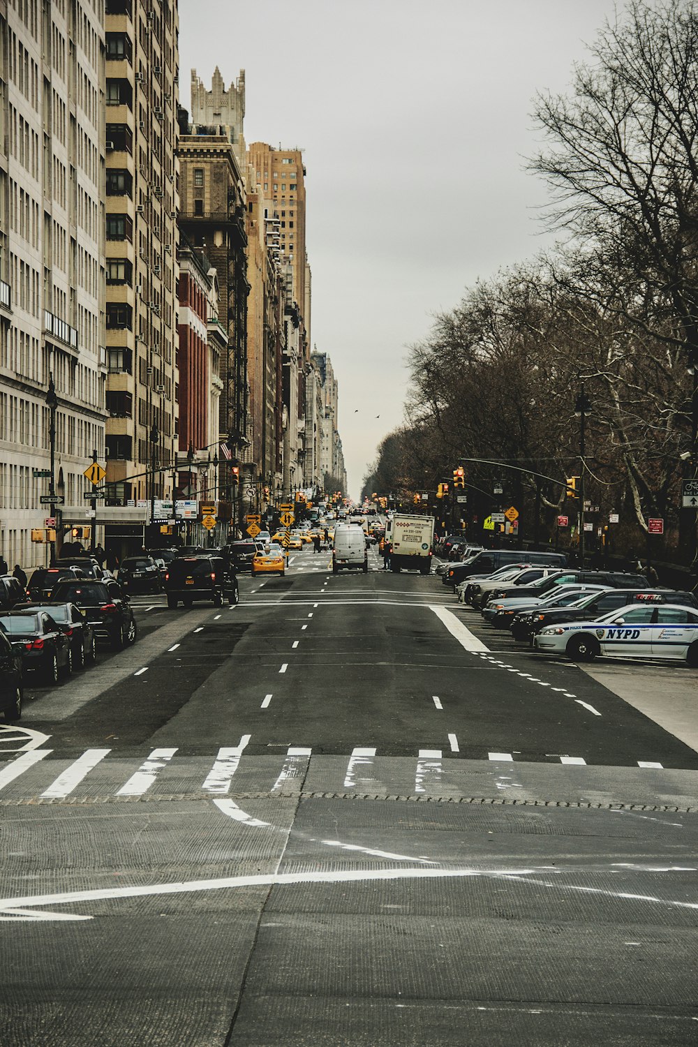 vehicles parked beside road