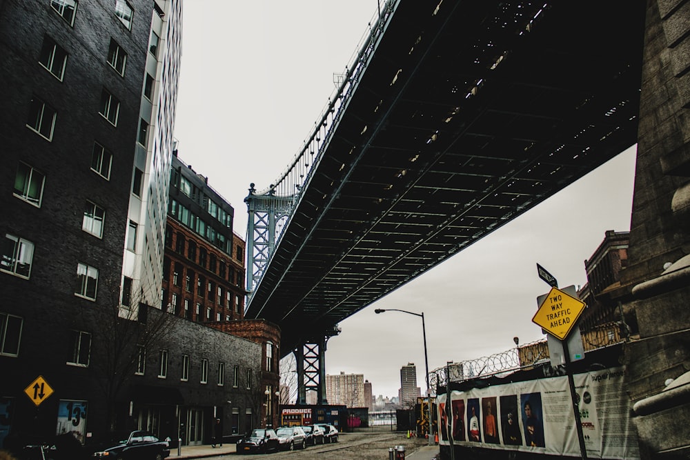low-angle photography of Manhattan Bridge during daytime