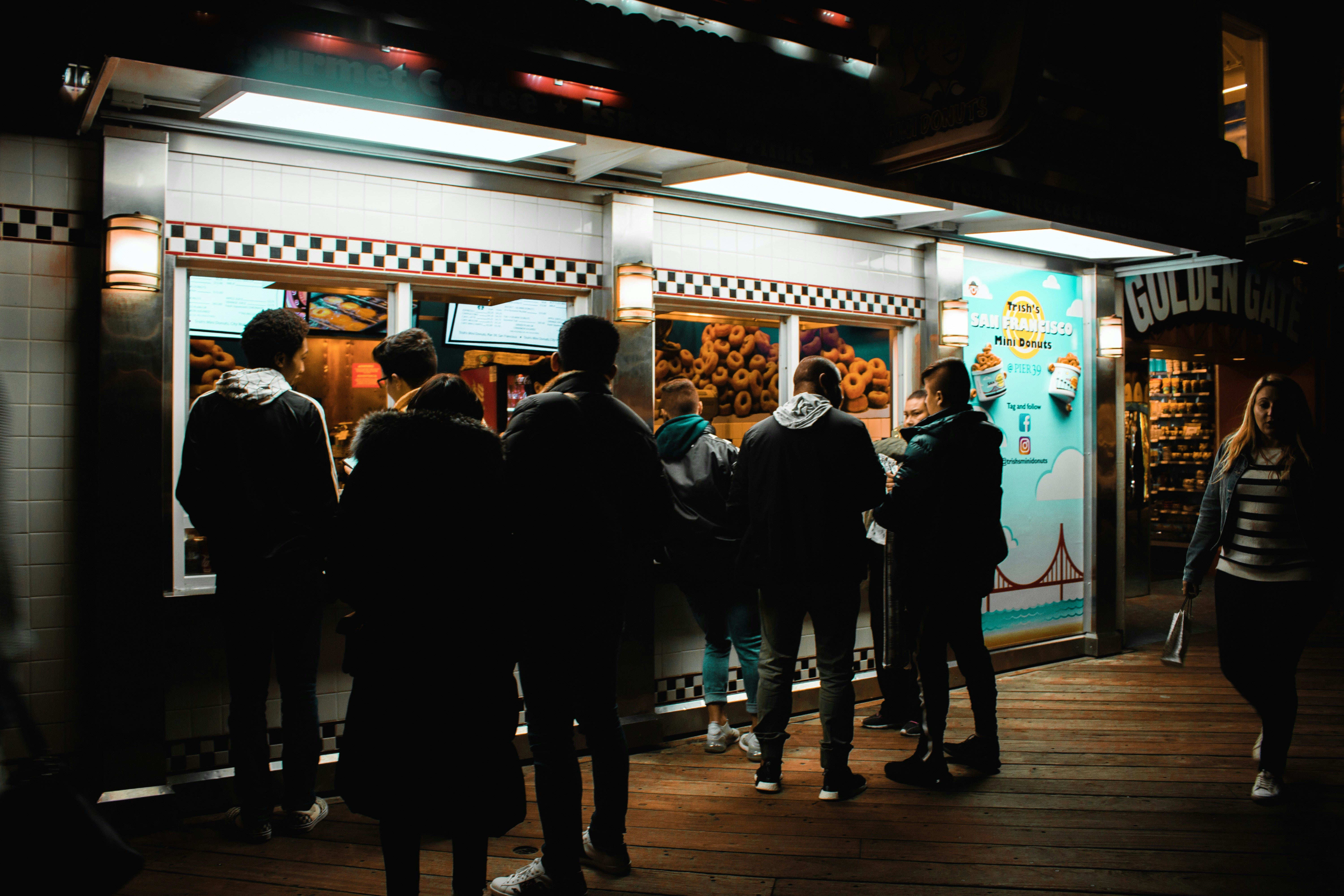 diverse customers waiting at food truck - used food trucks for lease