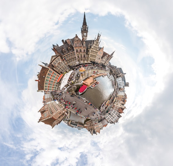 360 photography of building by the river with boats