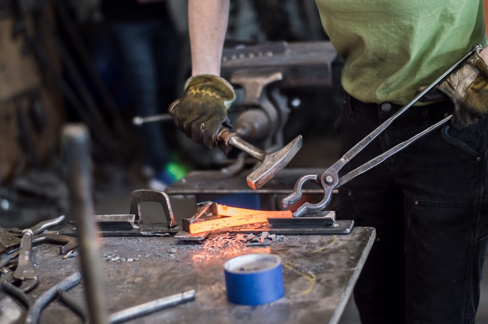 person smelting metal