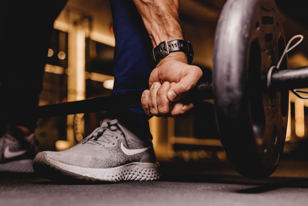 person about to lift barbell