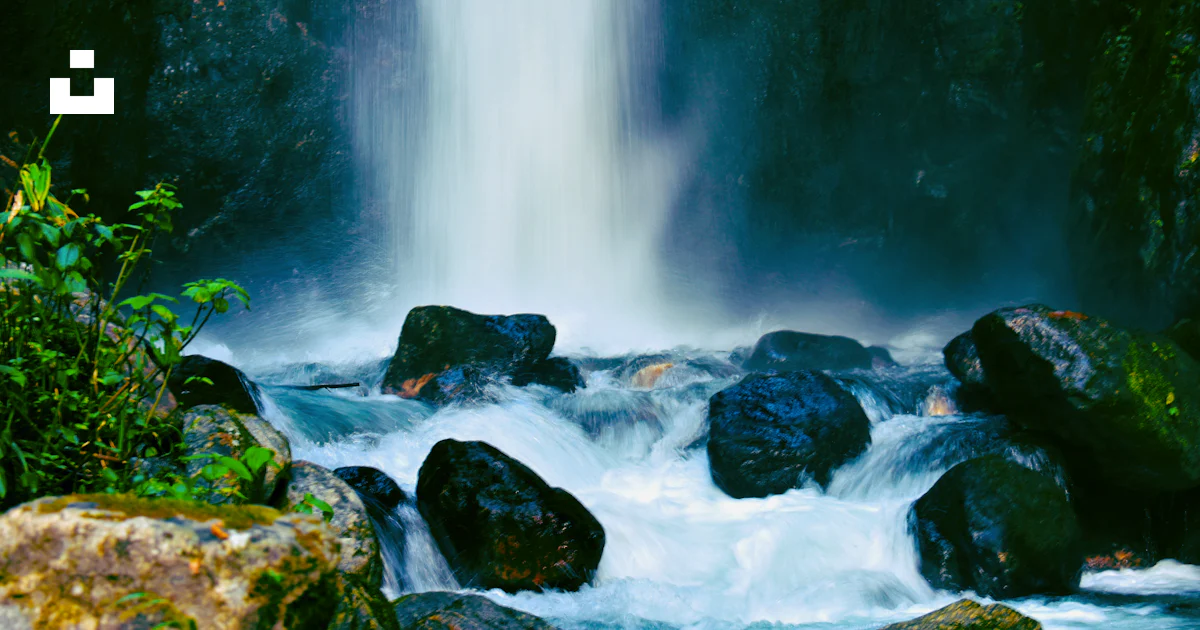 Large black rocks at the waterfalls photo โ Free Grey Image on Unsplash