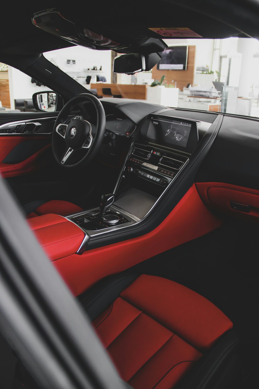 black and red car interior during daytime