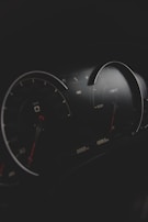 black and gray vehicle cluster panel displaying at 0