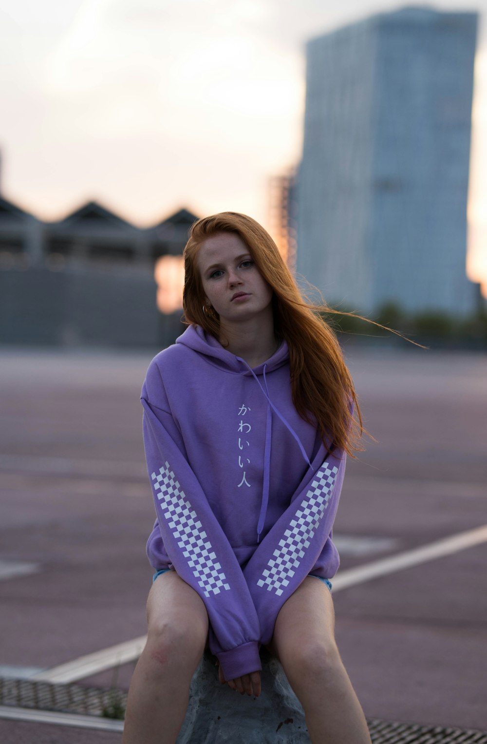 woman in purple hoodie