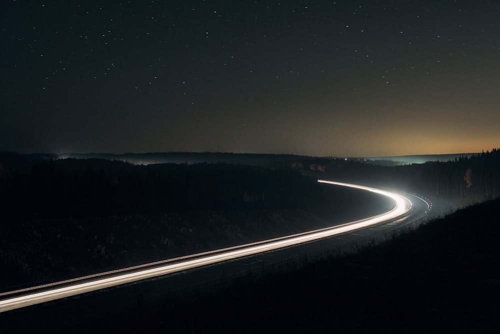 time lapse photography of vehicles during nighttime