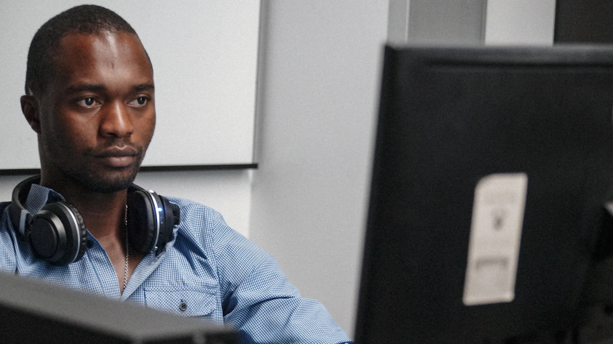 Black Kenyan SME owner using AI tools to manage business operations