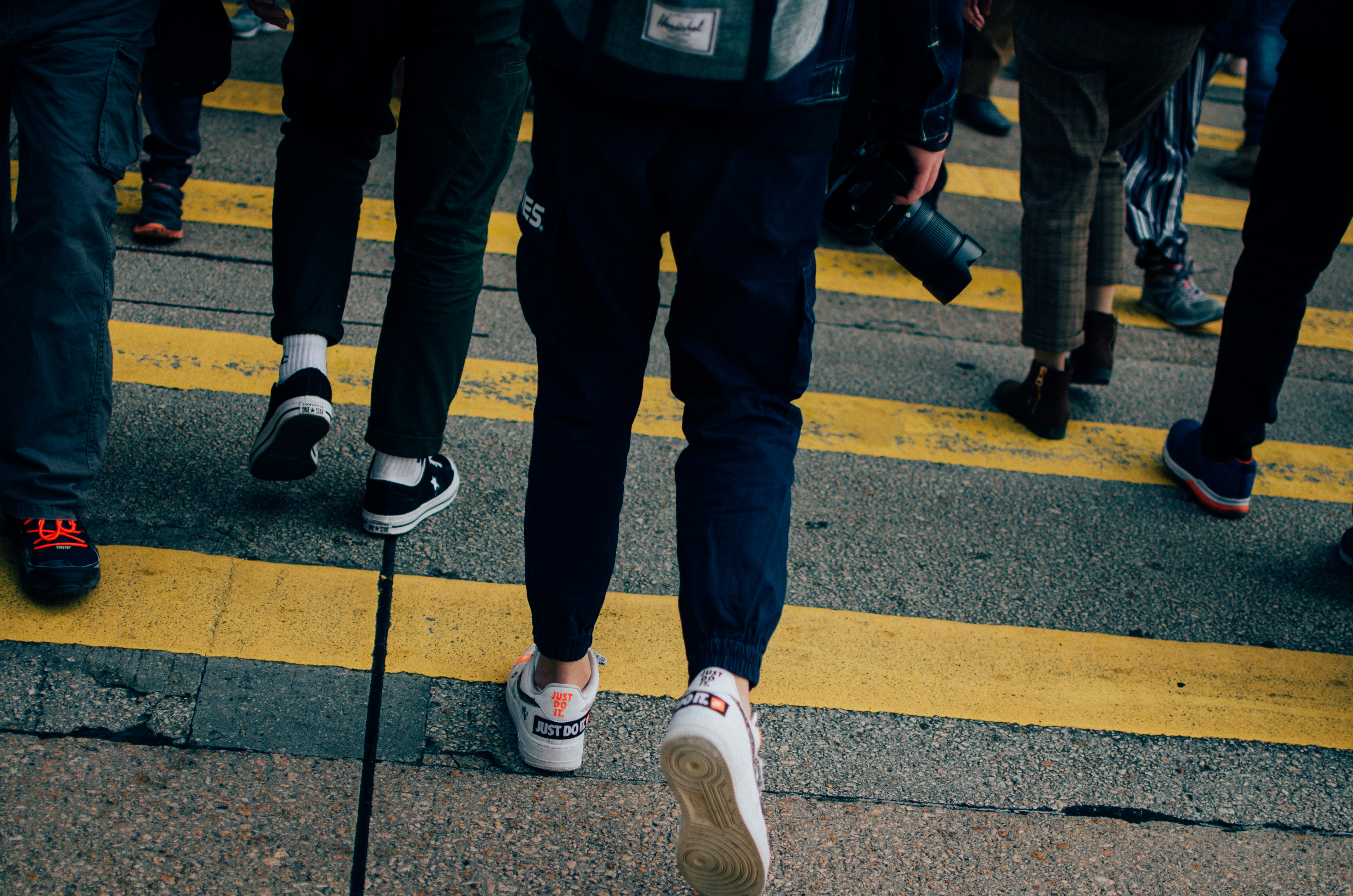 people walking on pedestrian lane