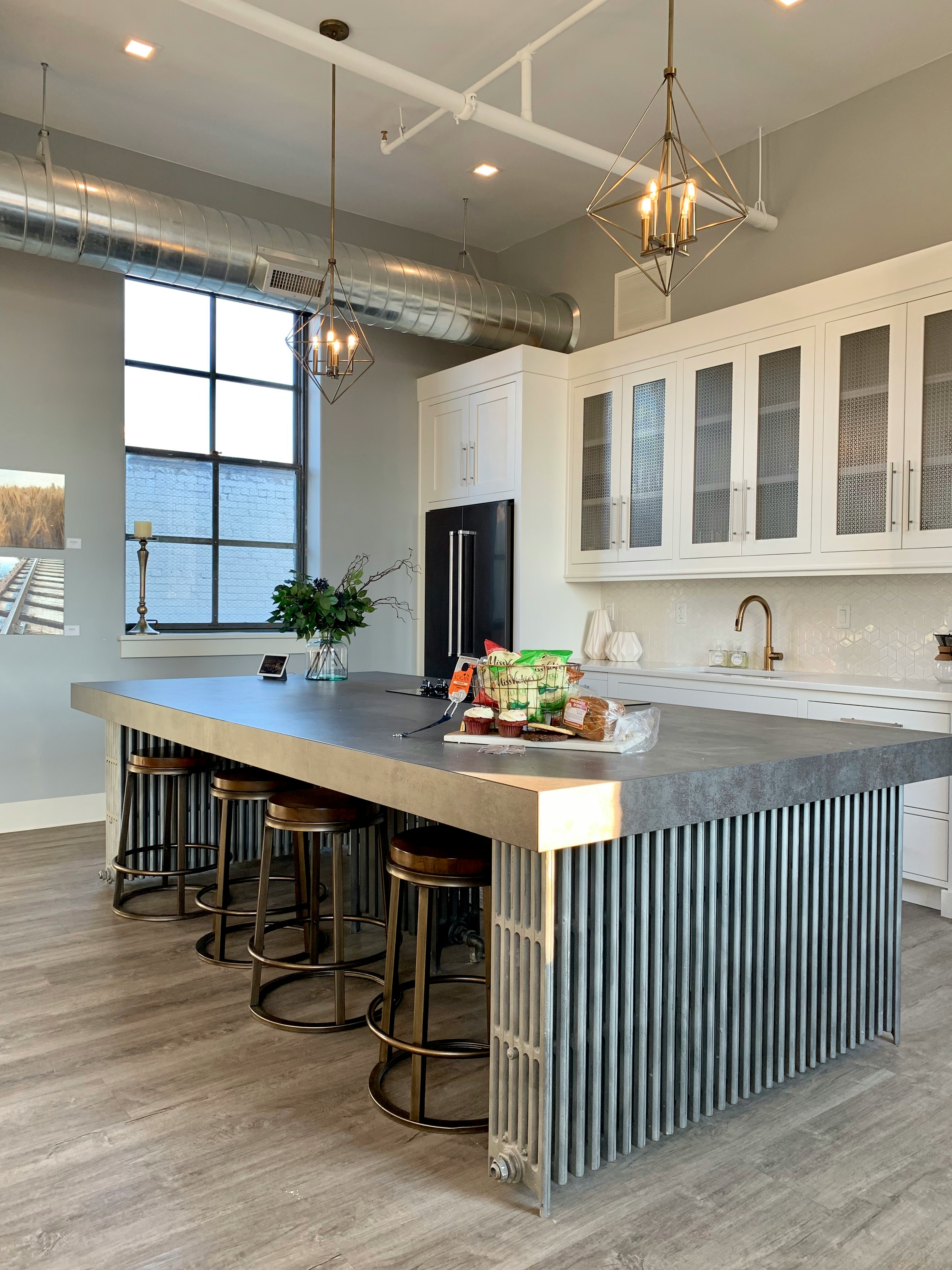 Modern Kitchen Design, Island Seating. 
Chic revitalization for an Industrial building that features the table top, embedded cooktop and supported by radiators native to the building. The perfect blend of historical elements and modern sensibilities. 

Flats Luxury Suites. 22 East Center, Logan Utah. Hotel, Airbnb, Rental Lodging #flatsluxurysuites #loganutah #loganvenues #BoutiqueHotel

https://www.instagram.com/AwCreativeUT/
https://www.AwCreativeUT.com/
https://www.citystorageif.com/
#AwCreativeUT #awcreative #AdamWinger Adam Robert Winger 
