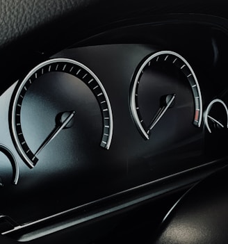 black vehicle instrument cluster panel