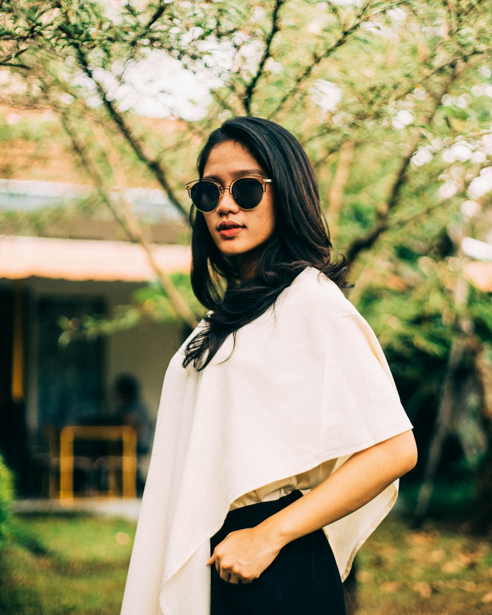 selective focus photography of woman wearing sunglasses