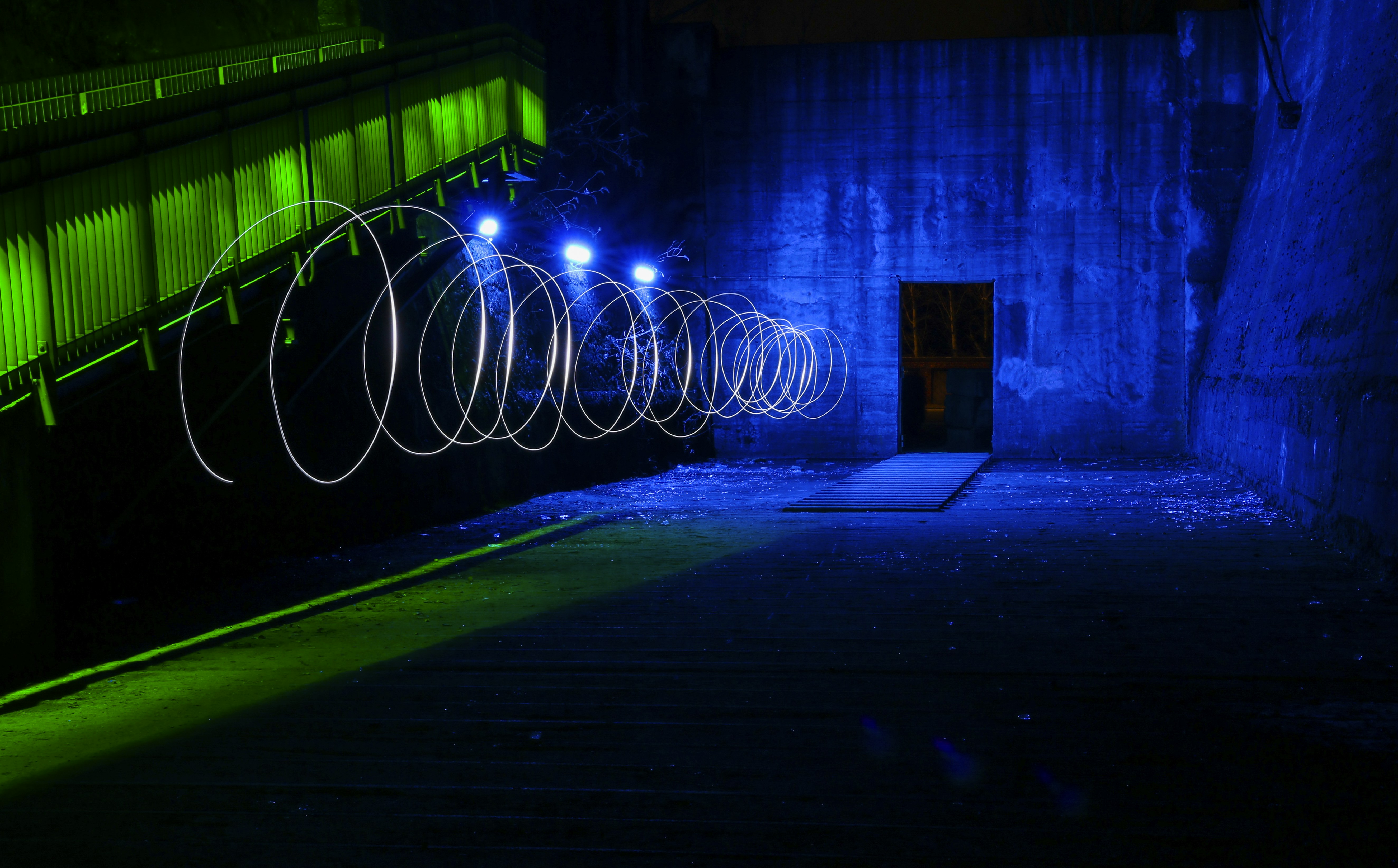 blue painted wall with green lights