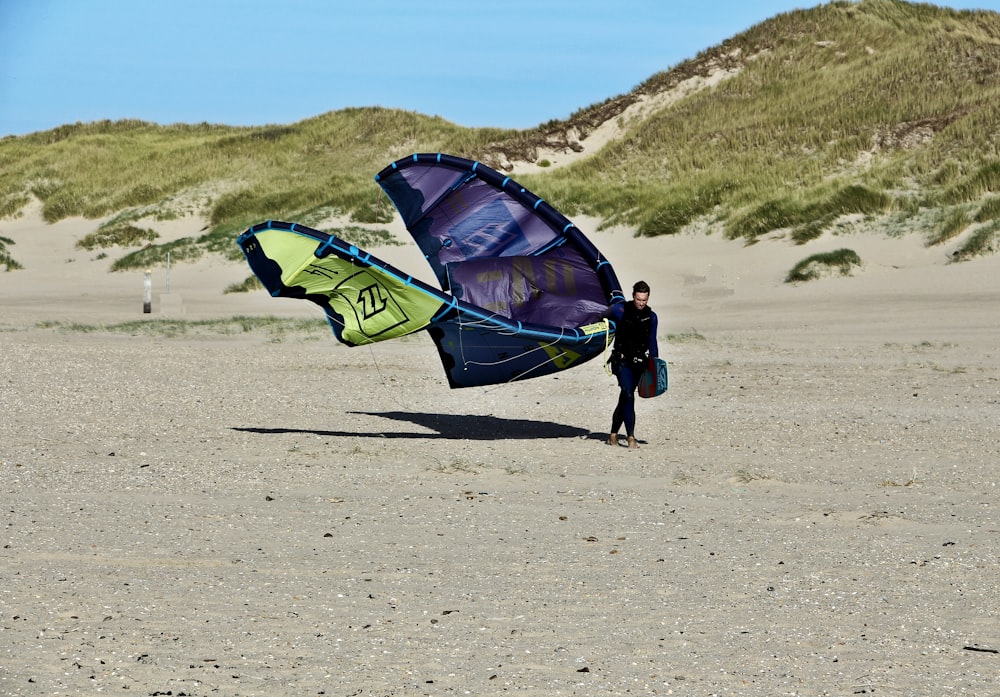 person holding parachute during daytime