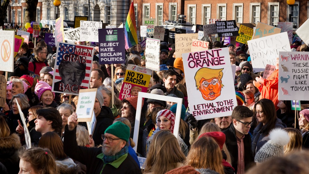 people demonstration during daytime