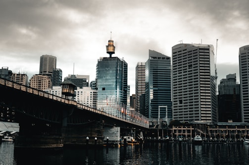 high rise buildings near bridge