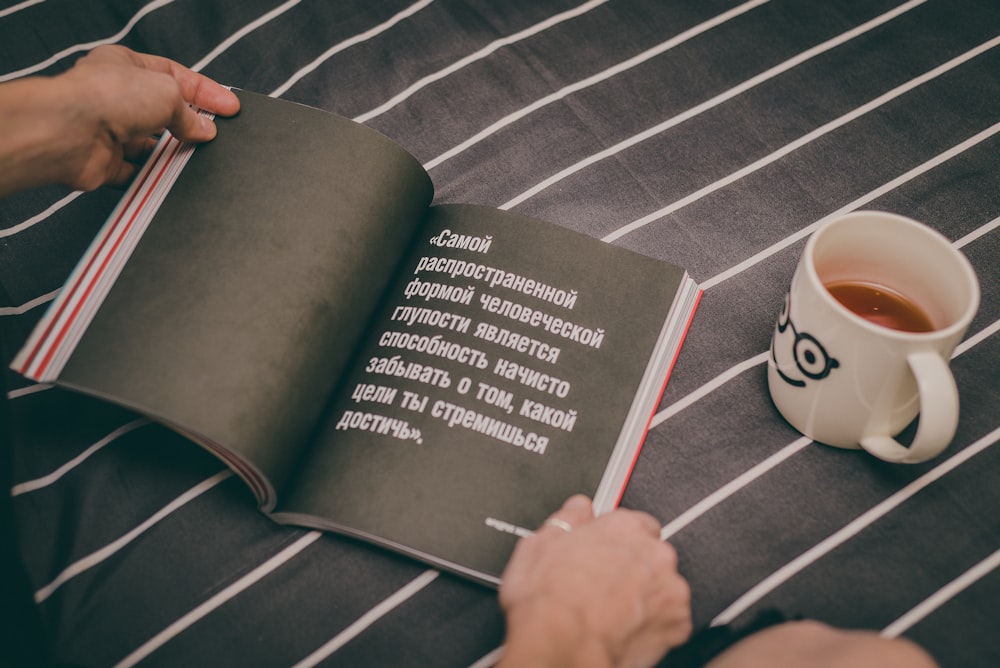 person holding book