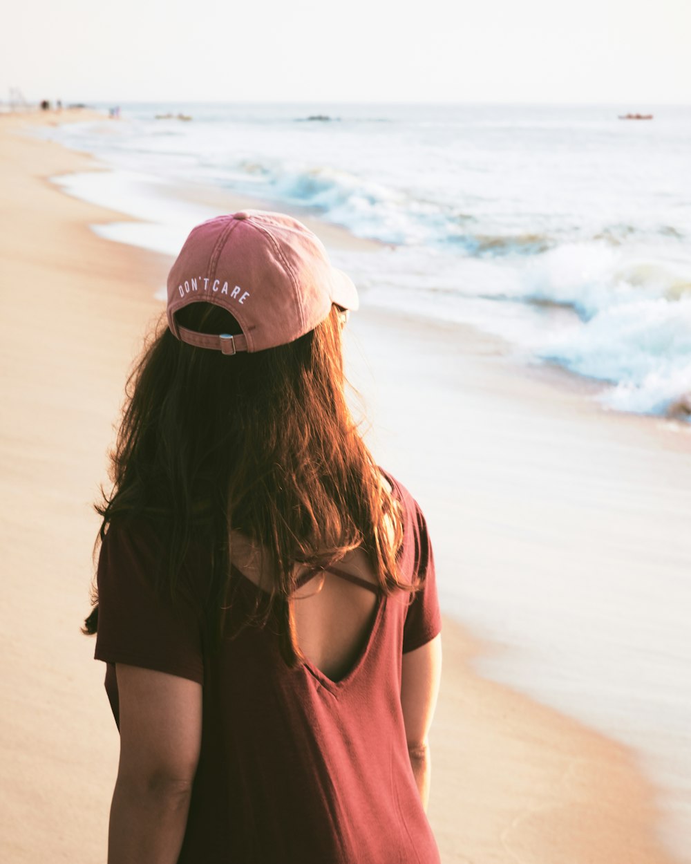 woman walking on sea shore