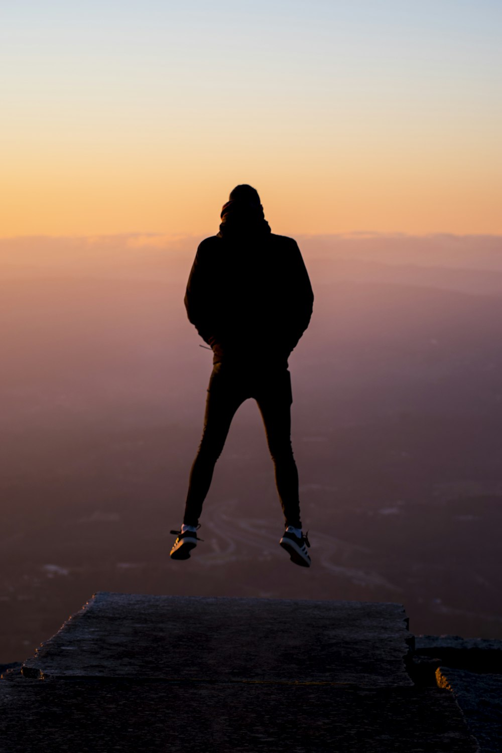 silhouette photography of person jumping