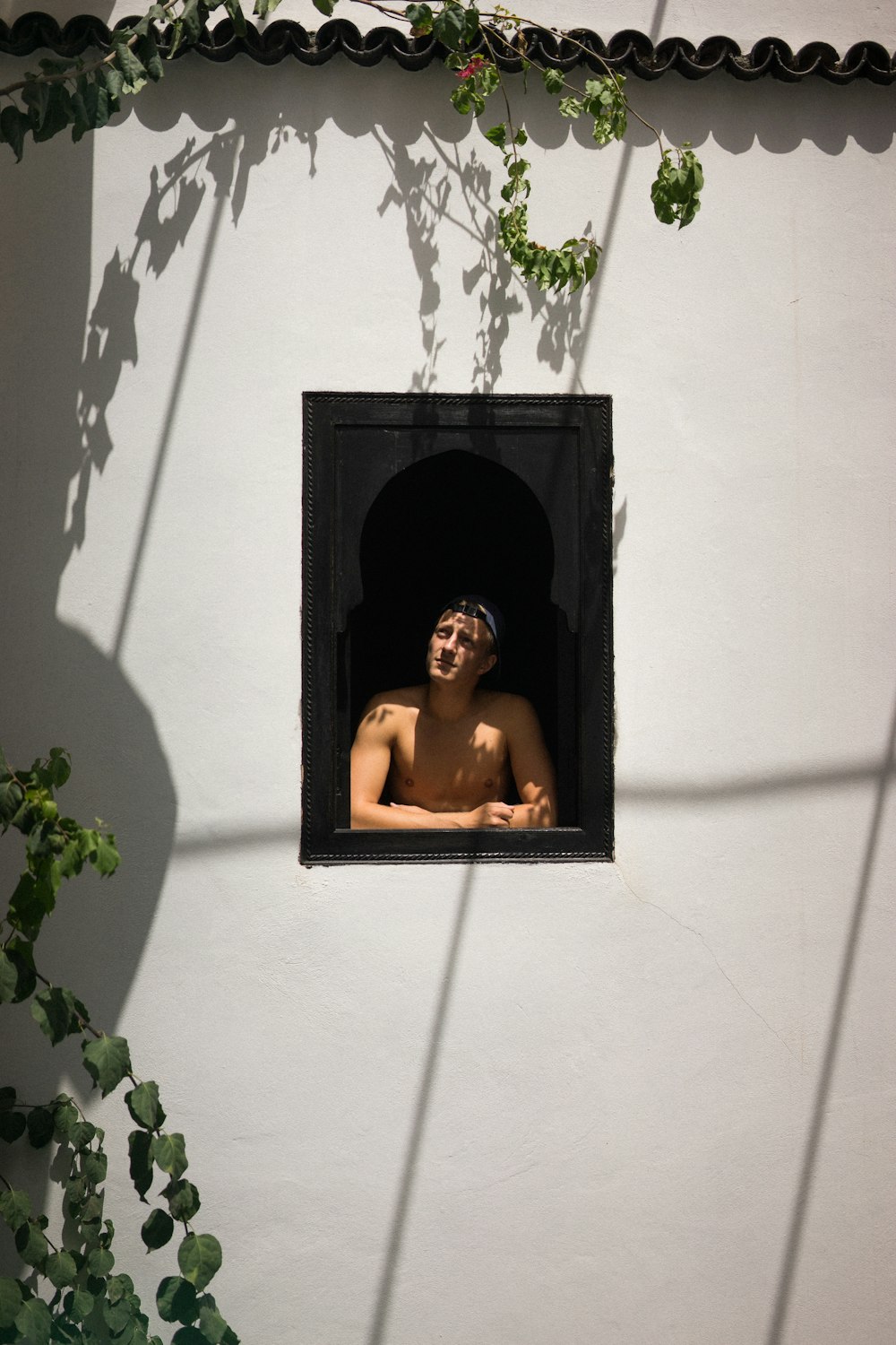 man in window