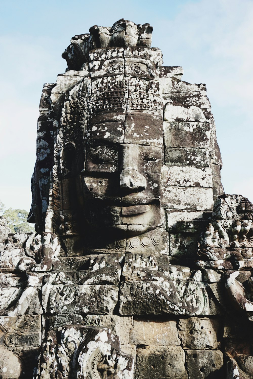 brown stone face formation during daytime