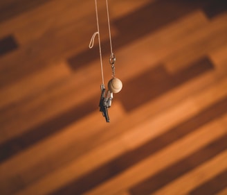 Selection of custom engraved wooden keychains neatly arranged on a white background