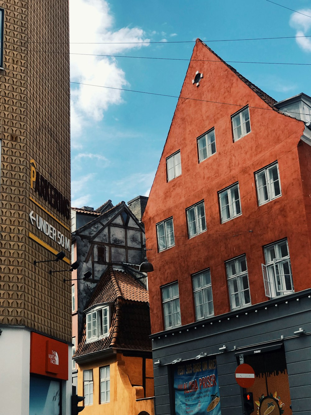 low angle photography of brown building during daytime