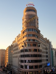 brown Schweppes building during daytime