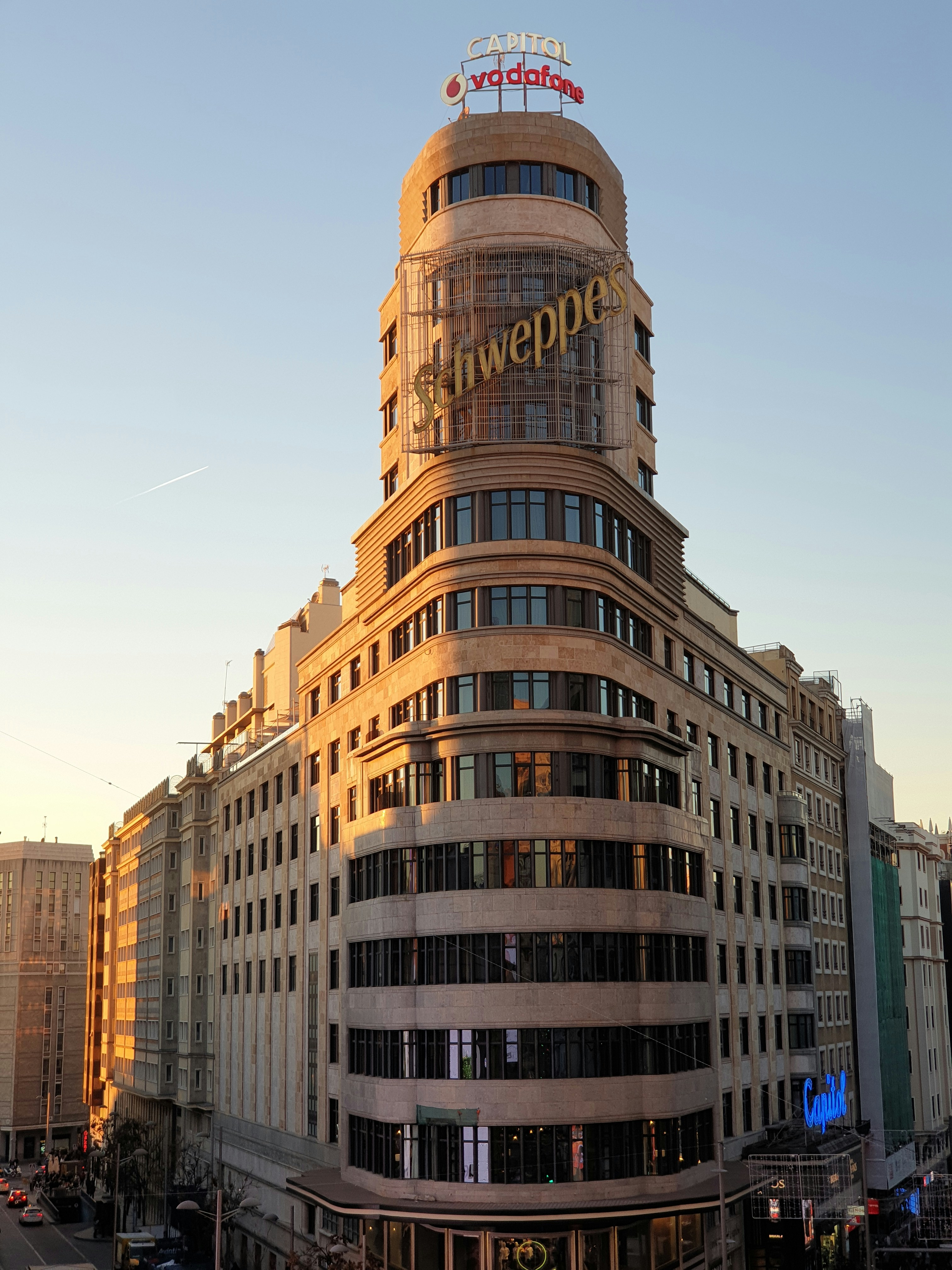 brown Schweppes building during daytime