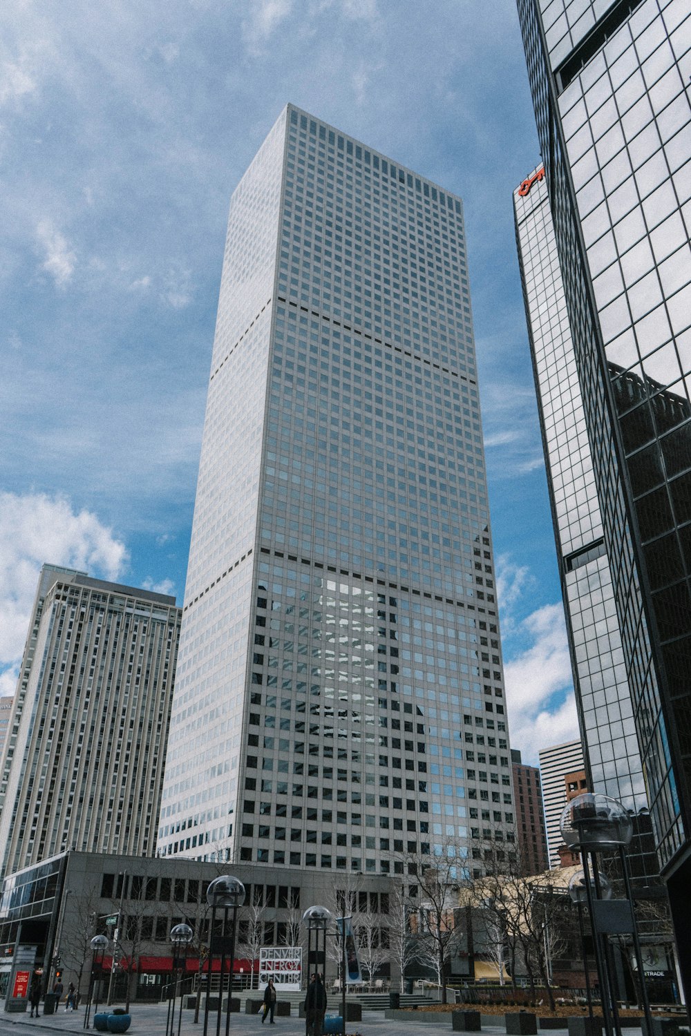 mid-rise and high-rise buildings under blue sky