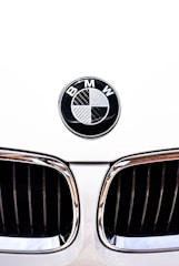 close-up photography of white BMW vehicle