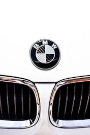 close-up photography of white BMW vehicle