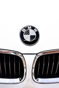 close-up photography of white BMW vehicle