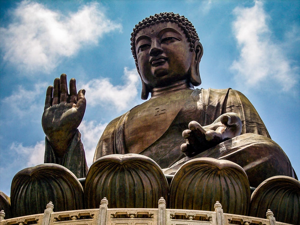 a large statue of a person holding a baby