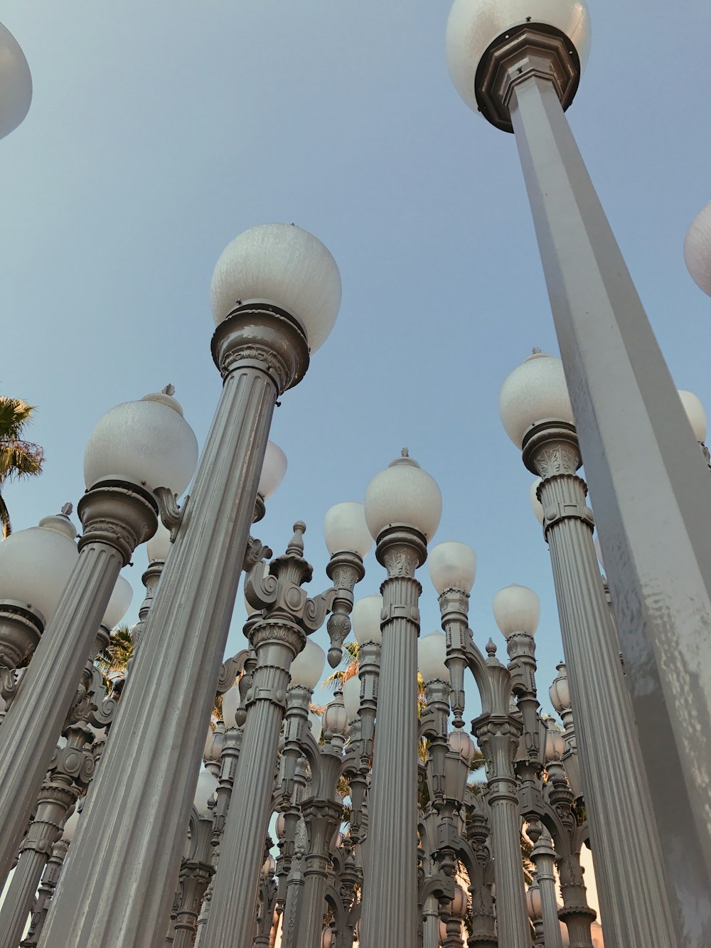 gray and white lights turned off outdoor during daytime