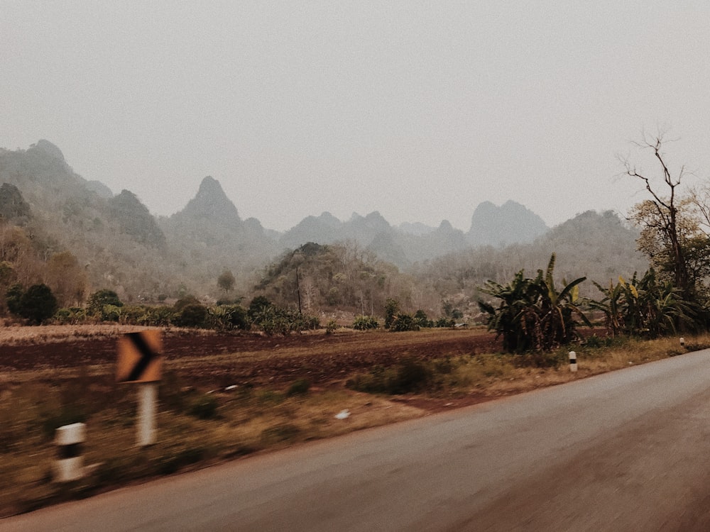 a road with a sign on the side of it