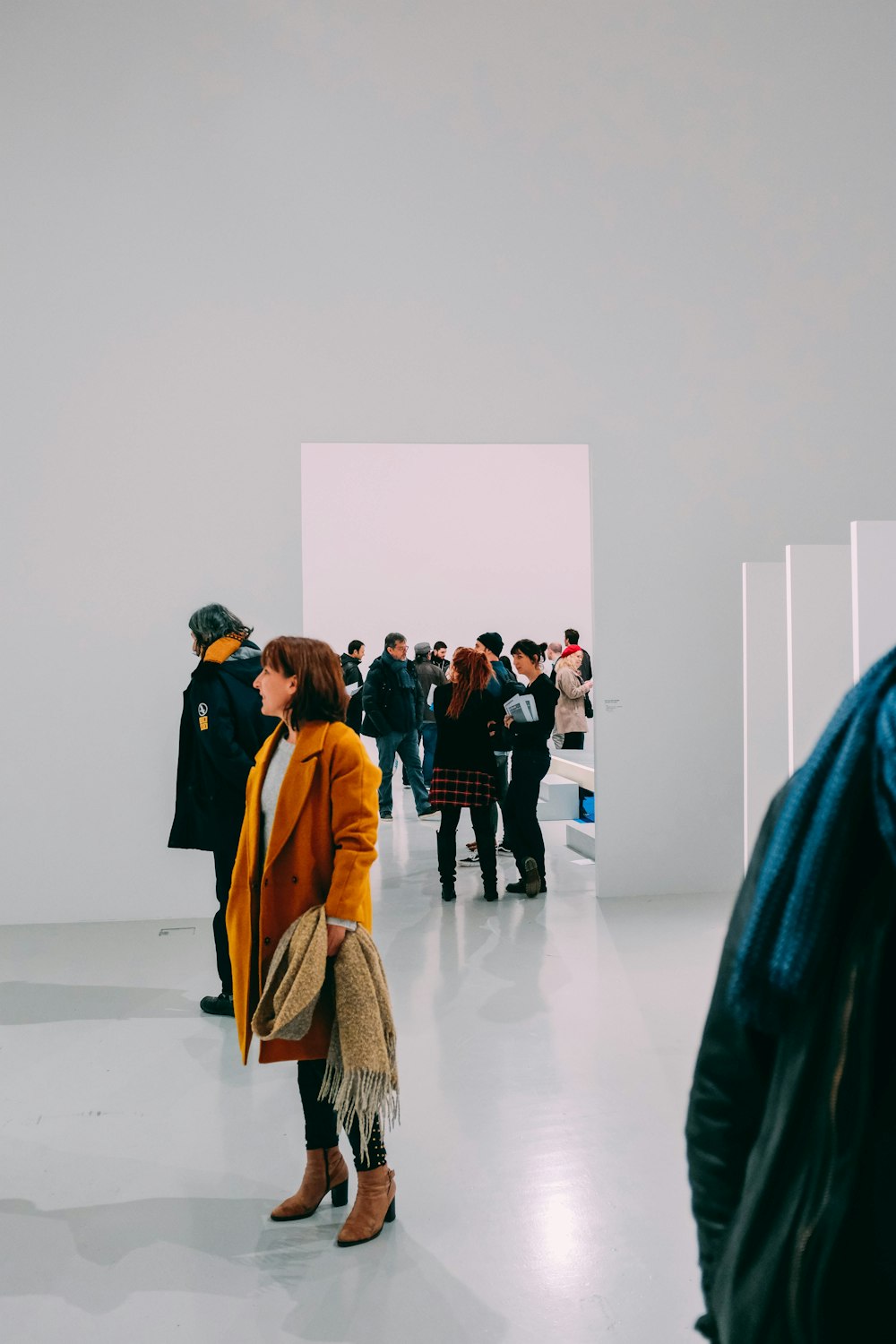 woman standing in side white room