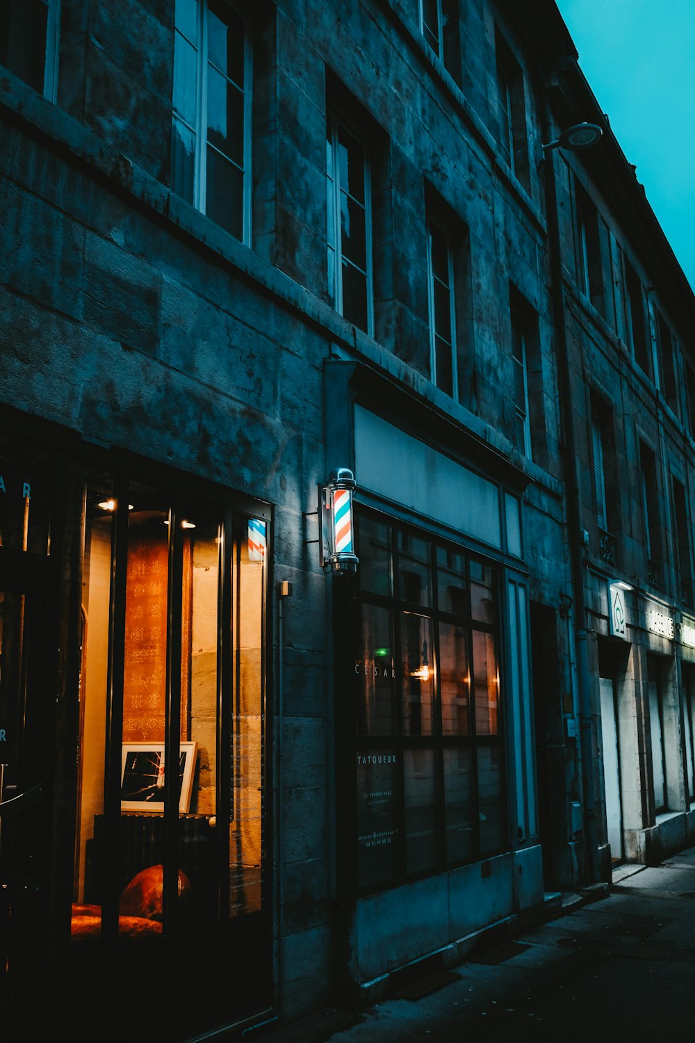 grey concrete building during night time