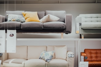 gray padded sofa collage