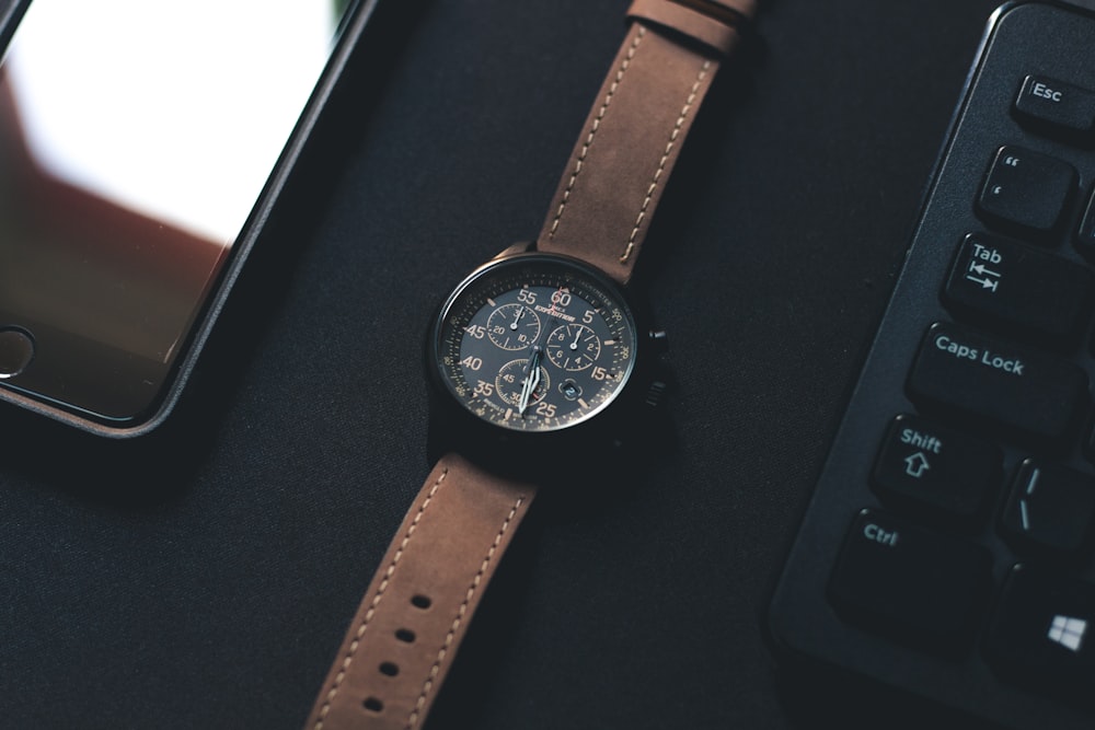 round black chronograph watch